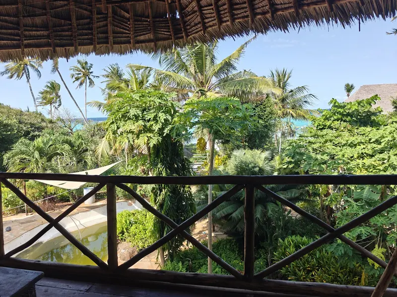 The view from the terrace across the gardens to the sea.